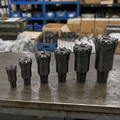 Multiple sizes of taper button drill bits for different drilling applications